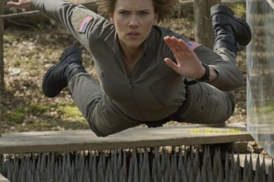 The mess hall was loud until it wasn’t. Forks froze mid-air. Conversations died mid-sentence. Because the rookie—the one Bravo 9 swore would wash out before sunrise—had just walked into the room like nothing in the world could touch her.