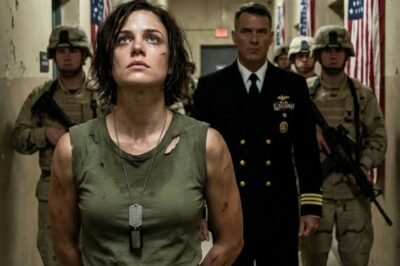 “Only operators carry that.”  The words didn’t come from the crowd. They came from behind it.