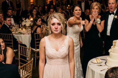 My sister grabbed the wedding cake and hurled it at me. “I said this was FAMILY ONLY! You weren’t invited!” My parents laughed first. Then the whole room followed. I walked out in tears. When I came back hours later… every face had gone pale.