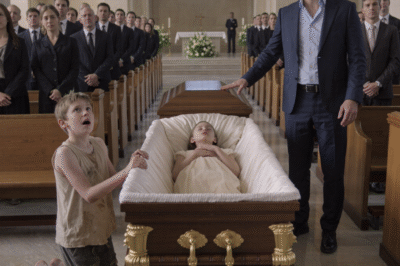 “STOP. Don’t bury her. Your daughter is still alive.” A homeless Black boy sprinted toward the casket—and exposed a truth so horrifying it left the millionaire frozen in place.