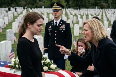My Sister Banned Me From My Grandpa’s Funeral. She Announced, “SHE RAN AWAY FROM HER DUTY. SHE’S A DISGRACE TO THIS FAMILY.” I Didn’t Argue. When The General Walked In, She Went Pale… thaokok Avatar Posted by thaokok – 24/02/2026 The rain started before sunrise. Not a storm. Not dramatic thunder. Just a steady, cold sheet that blurred marble and memory alike. By the time Colonel Avery Whitaker stepped out of her rental sedan at Arlington National Cemetery, the sky was the color of brushed steel and the air carried that sharp, metallic smell of wet stone. She wore a plain black coat. No medals. No ribbons. No visible rank. Generated image That was deliberate. The only thing she allowed herself was the silver ring on her right hand—worn thin at the edges from years of habit. She adjusted it once as she closed the car door. A small motion. A quiet anchor. arrow_forward_iosWatch More Pause 00:00 00:02 04:45 Mute Her grandfather, Sergeant Major Thomas Whitaker, had asked for a simple funeral. “No speeches,” he’d told her once during chemo. “No spectacle. Just fold the flag right.” He’d hated spectacle. Which made the row of black SUVs lining the curb feel almost insulting. Staff cars. Political plates. People who hadn’t called in months suddenly rediscovering patriotism because it photographed well. Avery took a breath and stepped toward the gate. The cemetery stretched out in disciplined rows of white markers, each one clean, identical, final. Rain darkened the grass between them. She was ten yards from the entrance when a voice cut through the drizzle. “Stop.” Avery didn’t flinch. She knew that voice. Brooke Whitaker stood beneath an oversized black umbrella held by a young man in a tailored coat. Brooke’s own outfit looked less like funeral attire and more like a corporate keynote—sharp lines, expensive heels, diamond studs that caught even the muted morning light. Two private security guards hovered behind her, broad-shouldered and watchful. Brooke’s smile unfurled slowly. “Well,” she said, voice carrying easily over rain. “Look who finally decided to show up.” A few guests turned. Avery met her sister’s eyes. “I’m here for Grandpa.” Brooke’s expression snapped tight. “You don’t get to say his name.” The words were sharp, rehearsed. “You disappeared for five years. No holidays. No birthdays. No hospital visits. And now you think you can walk in and sit in the family row?” Avery’s jaw tightened, but her posture remained still. “I was working.” Brooke laughed lightly—just loud enough to draw attention. “For those of you who don’t know,” Brooke announced, projecting her voice toward the small crowd gathering under umbrellas, “this is my sister. The one who ran away from her duty.” The phrase hung in the air. People shifted. Curiosity always wins over decorum. Brooke took a step forward, seizing the moment. “She’s a deserter,” she said clearly. The word landed heavy. It was chosen carefully. At Arlington, among uniforms and folded flags, that word was more than insult. It was accusation. Avery didn’t argue. She didn’t raise her voice. Years of training and loss had carved restraint into muscle memory. Brooke folded her arms. “Escort her out.” One of the security guards stepped forward, hand hovering near Avery’s sleeve. Rain streaked down Avery’s coat, but she didn’t move. “Don’t,” Brooke added sweetly. “We don’t need a scene.” The guard reached anyway. Before his hand could make contact, the cemetery gate behind them shifted open with a metallic groan. For a moment, everyone paused. Then it slammed shut again with a hollow clang, echoing down the walkway. Avery found herself standing just outside the bars. On the wrong side. Brooke turned back toward the entrance with satisfaction settling over her features. “Thank you,” she murmured to the guard. “We’ll handle the rest.” Inside the gate, guests resumed their positions. Brooke smoothed her coat, lifted her chin, and stepped toward the covered seating area where the casket rested beneath a canopy. Avery remained in the rain. She lifted her right hand and adjusted her silver ring again. Small habit. Quiet check. Inside, near the front row, a four-star general—his uniform darkened slightly by rain—shifted his gaze toward the gate. His eyes landed on Avery’s hand. On the ring. Recognition flickered. Not confusion. Recognition. His posture changed subtly, shoulders squaring with sudden attention. But Brooke didn’t see it. She was already turning toward her audience, confident she had reclaimed the narrative. Avery walked back toward her car without hurry. Each step felt deliberate. The rain soaked through her collar and down her spine, but she welcomed the cold. Cold kept emotion precise. She slid into the driver’s seat and closed the door gently. The heater coughed weakly to life. From her windshield, she could see the canopy, the flag-draped casket, and Brooke stepping forward with that polished composure she’d perfected over decades. Avery didn’t wipe the fog from the glass immediately. She let the blur exist. Inside, Brooke’s voice carried faintly over a microphone. “Today we gather to honor a man of legacy.” Legacy. Like branding. Avery’s hands rested loosely on the steering wheel. Five years. That was the narrative Brooke preferred. Five years of absence. Five years of “disappearance.” Brooke never mentioned classified deployments. Never mentioned blackout periods. Never mentioned that Thomas Whitaker had known exactly where his younger granddaughter was. “Do what you have to do,” he’d told her the last time she visited in uniform, before he stopped recognizing faces reliably. “Just don’t apologize for it.” She never had. Under the canopy, Brooke continued. “My grandfather believed in responsibility,” she said smoothly. “In family. In showing up.” Avery closed her eyes briefly. Showing up. She had been there during the chemo nights when Thomas vomited until he could barely breathe. She had held the basin. She had monitored the morphine. She had been there during the months when Brooke’s schedule was “too full” to accommodate hospital lighting and frailty. But Brooke had always excelled at optics. The rain softened into a lighter mist. Guests leaned closer under umbrellas as Brooke shifted tone. “In accordance with my grandfather’s final wishes,” she said, voice lowering for effect, “there has been some confusion regarding the estate.” Avery’s spine straightened. Estate. Brooke paused deliberately. “But I want to clarify. A revised will was signed three months before his passing.” Three months. Three months before Thomas died, he hadn’t been responsive. He hadn’t been able to hold a pen steady. Avery knew because she had charted medication changes. She had documented cognitive decline. She had recorded dates that didn’t bend for convenience. Through the windshield, she saw a suited attorney step forward with a folder. The rain felt colder. Avery reached into her coat and pulled out her phone. She switched it into a locked, encrypted mode. Her thumb hovered briefly over the screen. Then she sent a short, pre-coded message. Three characters. No context. No explanation. The network she had built didn’t need narrative. It needed coordinates. She set the phone face-down on her lap. Inside the gate, the attorney began reading. “The entirety of the Thomas Whitaker estate… shall transfer solely to my granddaughter, Rebecca—” Rebecca. Brooke’s legal first name. Brooke stood tall, chin lifted like she was receiving a commendation. Then she added, softly but audibly, “Grandpa understood that some people can’t carry responsibility.” Avery exhaled slowly. Responsibility. There it was again. She didn’t storm the gate. She didn’t call the police. She didn’t shout. She waited. Her phone vibrated once. A reply. Confirmed. Stand by. She looked back toward the canopy. Near the casket, the four-star general shifted in his seat. His gaze moved again toward the gate. Toward the car. Toward her. The rain had nearly stopped. Brooke smiled out at the crowd, convinced she had secured both sympathy and inheritance in one polished speech. Avery rested her head back against the seat. The heater rattled softly. Inside the cemetery, something had begun to change. And Brooke didn’t see it coming. The rain stopped completely as the attorney finished reading the revised will. It wasn’t applause that followed. It was something quieter. A shift in the air. Brooke stood beneath the canopy with practiced stillness, chin lifted slightly, hands folded as if she were graciously accepting an inevitable outcome. The suited attorney stepped back, expression neutral, folder closed. “The entirety of the Thomas Whitaker estate,” he repeated for clarity, “shall transfer solely to my granddaughter, Rebecca Whitaker.” Rebecca. Brooke didn’t correct him. She preferred the formal version when money was involved. A few murmurs rippled through the seated guests. Distant cousins. Former colleagues. Veterans in pressed uniforms who remembered Thomas as a disciplined man who believed in procedure. Brooke leaned toward the microphone again. “My grandfather trusted me to protect this family’s legacy,” she said smoothly. “He understood that some people—” she paused deliberately, letting her eyes drift toward the gate, toward the shape of Avery beyond it, “—cannot carry responsibility.” The word responsibility settled over the cemetery like fog. Beyond the iron bars, inside her car, Avery’s face remained composed. Three months before Thomas died, he had been legally incapacitated. Not confused. Not forgetful. Incapacitated. Avery had the documentation. She had signed hospital acknowledgments. She had recorded dosage changes. She had witnessed the moment when Thomas stopped recognizing which day it was. Three months before his death, he could not have revised anything. Her phone vibrated again. Second confirmation. Movement initiated. She didn’t smile. She didn’t need to. Inside the chapel area, the four-star general—General Marcus Hale—remained seated, hands clasped loosely over one knee. He had served with Thomas decades ago. They had disagreed loudly about strategy and laughed loudly about everything else. He knew Thomas Whitaker. Thomas had been meticulous about paperwork. Hale’s gaze moved toward Brooke as she continued speaking. “Grandpa believed in strength,” she said. “In those who stand firm.” Hale’s eyes drifted again toward the gate. He had seen the ring. He knew that ring. There are things in military service that never become public. Symbols that mark operations not listed on memorial plaques. The silver ring on Avery’s right hand wasn’t decorative. It was earned. And Hale had been at the ceremony when she received it. Brooke finished her speech with a final, polished nod. “Thank you all for honoring his memory.” The funeral director stepped forward, attempting to restore solemn pacing. But the mood had shifted. A few guests exchanged glances. Whispers carried softly through the rows. “She wasn’t even here,” someone murmured about Avery. “Or maybe she was somewhere else,” another voice answered quietly. Outside the gate, Avery stepped out of her car. She didn’t rush. She walked toward the entrance again, rainwater still glistening on the pavement. The security guard noticed her first. “Ma’am, you were asked to leave.” “I’m here to stand,” Avery replied evenly. “You’re not on the list.” Avery tilted her head slightly. “Neither is the truth,” she said calmly. Before the guard could respond, the iron gate opened again—this time deliberately. A black government sedan rolled up slowly. No sirens. No flashing lights. Just quiet authority. Two men stepped out. Both in uniform. Both carrying the weight of rank without theatricality. The guard hesitated. “Private service,” he began. The first officer handed him a small, embossed credential. The guard’s posture shifted instantly. “Yes, sir.” The gate remained open. Avery didn’t look at Brooke. Not yet. She walked through. Inside the seating area, Brooke’s smile faltered when she saw Avery re-enter. She leaned toward the nearest guard. “Remove her,” she hissed. The guard took a step forward. Before he could reach Avery, General Hale stood. The movement was subtle—but unmistakable. “Stand down,” he said. His voice wasn’t loud. It didn’t need to be. The guard froze. Brooke blinked. “General Hale, this is a private family matter.” Hale turned slowly toward her. “We are here to honor Sergeant Major Whitaker,” he replied. “And the integrity he demanded.” The rear doors of the chapel opened again. A line of uniformed personnel entered in disciplined formation. Their steps were synchronized, measured, and silent. The kind of movement that commands attention without requesting it. Guests stopped whispering. Another four-star followed behind them. General Raymond Keller. His eyes scanned the room once—then locked onto Avery’s right hand. The silver ring caught the light. Recognition settled. He walked down the aisle without looking at Brooke. When he reached Avery, he stopped. He came to full attention. And he saluted. Sharp. Precise. Unmistakable. The formation behind him followed in perfect unison. The room held its breath. Brooke’s face drained of color. Keller lowered his hand and spoke clearly enough for everyone to hear. “Colonel Avery Whitaker.” The title landed like thunder in a silent sky. Colonel. Not deserter. Not runaway. Colonel. Brooke’s fingers trembled near the podium. “She—she left,” Brooke stammered. “She abandoned—” “She was deployed,” Hale cut in evenly. The words didn’t shout. They corrected. Avery stepped forward then—not dramatically, not hurriedly. Just steady. “My grandfather didn’t care about titles,” she said calmly. “He cared about showing up.” Her voice carried without strain. “I was where he told me to be.” Brooke swallowed. “This is not the time—” “It’s exactly the time,” Avery replied. She removed a slim folder from her coat. Medical documentation. Cognitive evaluations. Physician statements. “These records confirm that three months before his passing, Sergeant Major Whitaker was legally incapacitated,” Avery said. “He could not have signed a revised will.” The attorney shifted uncomfortably. Brooke’s composure fractured at the edges. “You’re accusing me at a funeral?” Brooke snapped. “Yes,” Avery said. Calm. Final. She lifted her phone and tapped once. An audio file played. Clear. Undistorted. Brooke’s voice. “You won’t even remember this. Just sign it. I’ll handle everything.” The room didn’t erupt. It tightened. Faces changed. Perception shifted. Legacy meant something different now. Outside the chapel, two investigators stepped into position—quiet, patient. They had timelines. They had document analyses. They had signatures that didn’t match baseline samples. Brooke looked around for support. She found distance instead. “You’re ruining this,” she whispered toward Avery. “No,” Avery replied. “You did.” The funeral director cleared his throat softly. General Hale stepped forward and addressed the room. “Sergeant Major Thomas Whitaker served this country with honor. We will proceed accordingly.” No one objected. Brooke stepped back from the podium slowly, her spotlight dissolving under scrutiny. Avery moved to the casket. The flag was still perfectly placed. She placed her hand lightly on it—just for a second. “I’m here,” she murmured under her breath. Not to prove anything. Just to honor him. Outside, the rain began again. But this time, it felt cleansing. The silence after the audio clip ended was not chaotic. It was controlled. Which made it worse. Brooke’s voice—clear, coaxing, unmistakable—hung in the chapel long after the phone screen dimmed. “You won’t even remember this. Just sign it. I’ll handle everything.” There was no distortion. No ambiguity. No room to reinterpret tone. The funeral guests didn’t gasp. They recalibrated. General Hale didn’t look at Brooke. He looked at the casket. Then at Avery. “Proceed,” he said quietly to the funeral director. And just like that, the room shifted back to its intended purpose. Honor. Not inheritance. Brooke tried once more. “This is a private family dispute,” she said, voice tightening at the edges. “It has no place here.” General Keller turned toward her slowly. “Fraud involving a decorated non-commissioned officer,” he replied evenly, “is not private.” The distinction was surgical. The two investigators who had entered earlier stood near the rear doors. Not aggressive. Not intrusive. Simply present. One of them spoke calmly. “Ms. Whitaker, we’ll need you to remain available after the service.” Brooke’s hands curled slightly into fists. “This is absurd,” she whispered. No one rushed to agree. Avery stepped forward and took her place near the casket. The honor guard prepared with quiet precision. Boots aligned. Gloves adjusted. Movements synchronized. The rifle volley echoed cleanly across the cemetery grounds. Three shots. Then three more. Then three. The sound cracked through the air and settled into the rows of white markers beyond. Avery didn’t flinch. She had heard worse. But this time, the sound wasn’t threat. It was tribute. The bugler stepped forward. “Taps” rose into the damp air, fragile and unmistakable. Several guests bowed their heads. Some wiped at their eyes. Brooke remained rigid, her composure stretched thin like over-pulled thread. The flag-folding began. Each motion deliberate. Each crease sharp. The honor guard presented the folded flag to General Hale. Hale stepped toward Avery. His voice lowered slightly. “On behalf of a grateful nation…” He paused. The formality shifted. “…and on behalf of those who know what he gave.” He handed the flag to her. Not to Brooke. To her. Brooke inhaled sharply. “That’s not protocol—” she began. Hale met her gaze. “It is.” The word was absolute. Avery accepted the flag with steady hands. Every fold aligned. Every edge exact. Her grandfather had taught her to fold cloth before she could drive. “Sharp corners mean you care,” he used to say. She cared. When the ceremony concluded, guests began to disperse slowly, murmuring in low voices. Some approached Avery quietly. A retired colonel clasped her hand. “Your grandfather spoke of you,” he said simply. An older woman Avery vaguely recognized from Thomas’s veterans’ group squeezed her shoulder. “He was proud,” she whispered. Brooke stood near the podium, alone now. The umbrella bearer had stepped back. The security guards kept distance, uncertain which direction loyalty now required. One of the investigators approached Brooke calmly. “Ms. Whitaker, we’d like to speak with you.” “This is harassment,” Brooke snapped, though the snap lacked force. “We have preliminary analysis indicating irregularities in the will documentation.” “It was legally drafted!” “The signature timestamp conflicts with hospital admission records.” Brooke’s breathing grew shallow. “You can’t do this here.” “We aren’t,” the investigator replied. “We’re doing it now.” Avery walked past her sister without stopping. Brooke grabbed her wrist. “Did you plan this?” Brooke hissed. Avery looked down at the hand gripping her coat sleeve. “No,” she said calmly. “You did.” Brooke’s eyes flashed. “You disappeared. You left everything to me.” “I was deployed,” Avery replied. “You could have said something.” “I couldn’t.” “You always thought you were better than this family.” Avery tilted her head slightly. “No. I just refused to perform.” The words landed harder than shouting would have. Brooke released her. “You’ve humiliated me.” Avery held her gaze. “You humiliated yourself.” Outside the chapel, the rain intensified briefly before easing again. Investigators guided Brooke toward one of the black SUVs—not with force, but with inevitability. Cameras from a few local outlets lingered at a distance. No dramatic arrest. No handcuffs. Just questions that would not disappear. As Brooke was escorted away, she turned once toward Avery. Not pleading. Not apologizing. Calculating. But calculation requires leverage. And she had lost hers. General Hale stepped beside Avery. “You could have stopped this quietly,” he said. “Yes.” “Why didn’t you?” Avery looked out over the rows of white headstones. “Because he hated shortcuts.” Hale nodded once. “He’d have approved.” General Keller approached next. “You’ve made a powerful enemy,” he observed calmly. “She made herself one,” Avery replied. Keller studied her for a long moment. “Colonel, Arlington doesn’t forget names.” “Neither do I,” she said. As the cemetery emptied, Avery remained for several minutes alone by the fresh earth. The investigators’ vehicles were gone. Brooke was gone. The spectacle had dissolved. Only quiet remained. Avery knelt briefly and pressed her fingers into the damp grass. “I didn’t come to fight,” she murmured. Wind moved softly through the trees. She adjusted the silver ring on her hand. Habit. Check. Anchor. Footsteps approached from behind. General Hale again. “You’re clear,” he said. “I know.” “Will you attend the hearing?” “Yes.” “Good.” He hesitated. “Your grandfather once told me something,” Hale added. Avery rose slowly. “He said you’d rather lose comfort than compromise.” She allowed herself the faintest smile. “He wasn’t wrong.” Hale returned the expression. “No. He wasn’t.” As Avery walked back toward her car, the sky finally began to break. A thin line of light pierced through cloud cover. Arlington returned to its quiet order. The headline Brooke had tried to write—that Avery was a disgrace, a deserter, a runaway—had dissolved in less than an hour. Not through shouting. Not through theatrics. Through evidence. Through rank earned, not inherited. Through a name spoken clearly in a room that could not ignore it. “Colonel Avery Whitaker.” Titles didn’t matter to Thomas. But integrity did. And integrity had just changed the room. The cemetery was nearly empty by the time Avery reached her car again. Rainwater dripped from tree branches in slow, rhythmic taps. The rows of white headstones stood unmoved, indifferent to family conflict and public embarrassment alike. Arlington did not bend for spectacle. It recorded names. That was all. Avery placed the folded flag carefully on the passenger seat. She didn’t start the engine. Instead, she sat there in stillness, hands resting lightly on the steering wheel, breathing evenly. She hadn’t come for confrontation. She had come to show up. The rest had followed. Her phone vibrated. Encrypted channel. Update: Probate court filing initiated. Signature review pending. Financial transfers frozen. Efficient. Clean. Controlled. No shouting necessary. Three days later, the hearing was scheduled. Not dramatic. Not publicized widely. Just a probate courtroom with beige walls and fluorescent lights that hummed faintly overhead. Brooke arrived dressed in cream instead of black this time. Her composure had returned, but it was thinner—like a glass façade after impact. Her attorney did most of the speaking. “This is a misinterpretation,” he argued smoothly. “Our client acted in good faith.” Avery sat quietly at the opposite table. In uniform. Not full dress. But unmistakable. The silver ring remained on her right hand. The judge—a gray-haired woman with sharp eyes—reviewed the medical records first. “Three months prior to death,” she said slowly, “Sergeant Major Whitaker was under hospice care and legally documented as cognitively incapacitated.” Brooke’s jaw tightened. Her attorney shifted tactics. “The recording could be edited.” Avery placed her phone on the table without ceremony. “Forensic verification attached,” she said calmly. “Time-stamped. Cross-referenced with hospital visitor logs.” The judge skimmed through the attached documentation. “You were present during hospice?” she asked Avery. “Yes, Your Honor.” “While deployed?” “Yes, ma’am.” Brooke blinked sharply. “You weren’t here,” Brooke said, unable to contain herself. “I was,” Avery replied evenly. “You just didn’t look.” The judge glanced between them. “Ms. Whitaker,” she said to Brooke, “you signed as executor under the revised document?” “Yes.” “Despite medical records stating your grandfather was legally unable to sign?” Brooke hesitated half a second too long. “My understanding was that—” “That will is void,” the judge said firmly. “We will revert to the previously filed estate plan.” Silence fell. Brooke’s expression fractured. “The original will divided the estate equally between both granddaughters,” the judge continued. “With a designated portion allocated to the Veterans Outreach Foundation.” Avery didn’t move. Brooke did. “That’s absurd,” she whispered. “He changed his mind.” “Evidence suggests otherwise,” the judge replied. Then, final. “This court finds sufficient cause to refer the matter for further investigation regarding attempted fraud.” The gavel struck once. Clean. Controlled. Done. Outside the courthouse, Brooke’s polished posture had deteriorated into rigid desperation. “This isn’t over,” she said quietly as Avery passed her. “It is,” Avery replied. “You think this makes you righteous?” “I think it makes him respected.” Brooke’s eyes burned. “You always had to be the hero.” Avery paused. “No,” she said calmly. “I just refuse to be the villain in your version of events.” Brooke’s shoulders dropped slightly. For the first time since the cemetery, her voice lost its performative sharpness. “You left me to handle everything.” Avery studied her sister’s face. “I trusted you to,” she said. Brooke looked away. That was the closest she would come to confession. The estate resolution took weeks. Accounts audited. Properties reassessed. Donations processed. The Veterans Outreach Foundation received its designated portion in full. Avery personally attended the check presentation—not for publicity, but because Thomas would have. The director of the foundation shook her hand firmly. “Your grandfather spoke about you,” he said. “He said you understood service.” “I learned from him,” Avery replied. Not from Brooke. Not from inheritance. From him. Brooke’s social standing shifted quietly. Not publicly ruined. Not theatrically dismantled. But recalibrated. Board invitations slowed. Networking calls went unanswered. Reputation, once polished, now carried a footnote. Fraud doesn’t need spectacle to stain. It lingers. Brooke stopped reaching out. Not because she forgave. Because she recalculated. Avery did not chase reconciliation. Some fractures don’t mend. They redefine. One month after the funeral, Avery returned alone to Arlington. Clear skies this time. No rain. No crowd. She knelt beside Thomas Whitaker’s headstone and ran her fingers lightly over the engraved name. SERGEANT MAJOR THOMAS E. WHITAKER U.S. ARMY She placed the folded flag at the base of the stone for a moment, just long enough to breathe. “They tried to rewrite you,” she murmured. “I didn’t let them.” The wind moved gently across the rows. She adjusted her silver ring again. Habit. Anchor. Memory. Footsteps approached quietly. General Hale stopped a respectful distance away. “Thought I might find you here,” he said. Avery rose. “Just checking corners,” she replied. Hale nodded. “He’d be proud.” She didn’t answer immediately. “I didn’t do it for pride,” she said finally. “I know.” They stood in silence for a moment. Then Hale added quietly, “You didn’t shout.” Avery’s mouth curved slightly. “Didn’t need to.” Integrity doesn’t roar. It stands. It documents. It waits. It holds its ground. Brooke had tried to weaponize absence. Tried to paint service as abandonment. Tried to turn grief into leverage. But some truths don’t require amplification. They just require patience. Avery walked back toward her car one final time. The silver ring caught sunlight briefly before she slid her hands into her coat pockets. At the funeral, Brooke had called her a disgrace. A deserter. A runaway. Instead, a general had stood. An entire formation had saluted. And her name had been spoken clearly in a chapel that could not ignore it. “Colonel Avery Whitaker.” Not because she demanded it. Because she earned it.